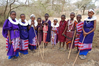 several children wearing traditional Maasai dress