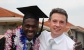 two men at a graduation