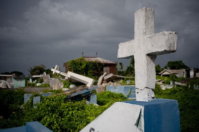 broken cement cross standing