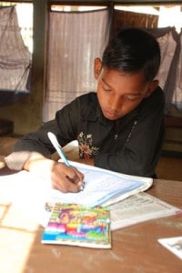 boy writing a letter