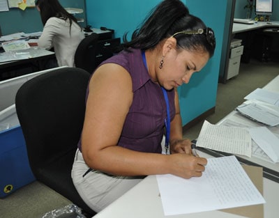 woman translating a child letter