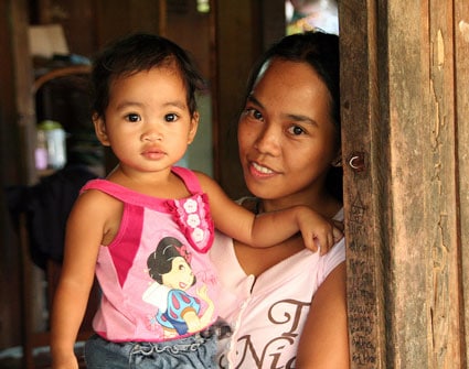 woman holding young child