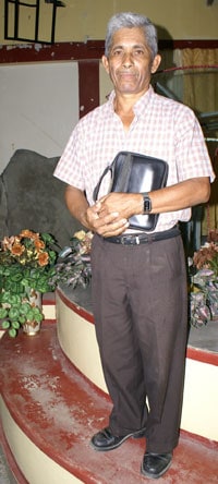 Man holding a black bag