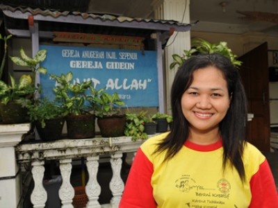 young lady wearing yellow shirt