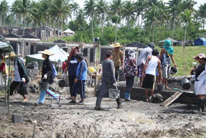 men and women doing construction