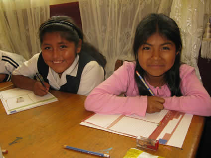 two girls writing letters