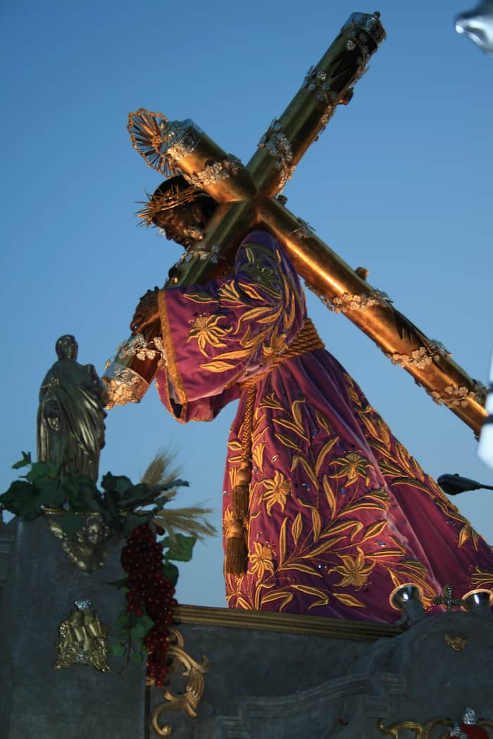 A statue of Jesus carrying the cross for a parade for Easter in Guatemala