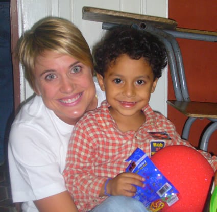 woman holding child in her lap