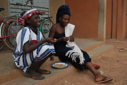 Two children sitting on steps