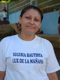 smiling woman wearing white shirt
