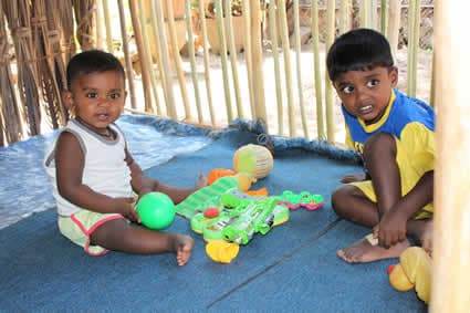 kids playing in a playhouse