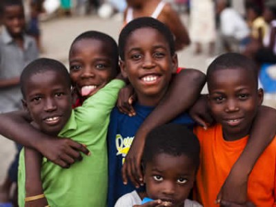 Several smiling boys.