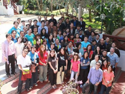 large group of Thai people posing for camera