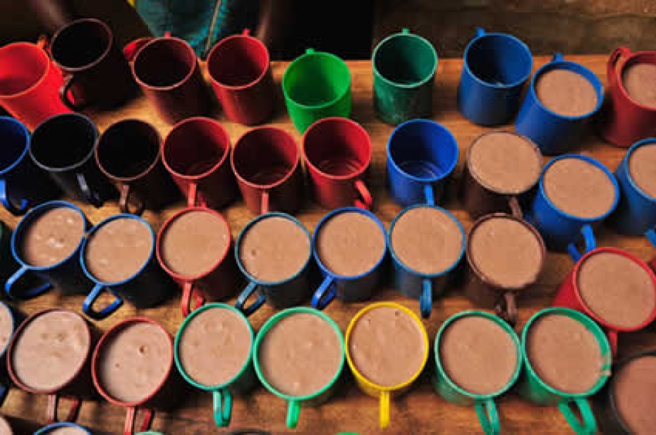 colorful mugs sitting on table