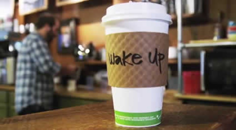 Wake Up Coffee cup with wake up written on it.
