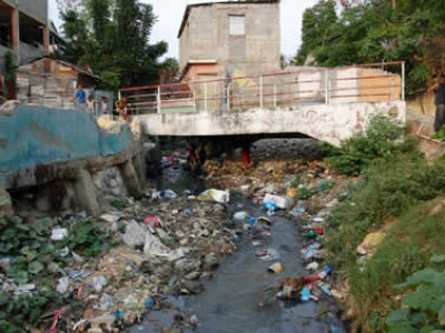 sewer and garbage near homes