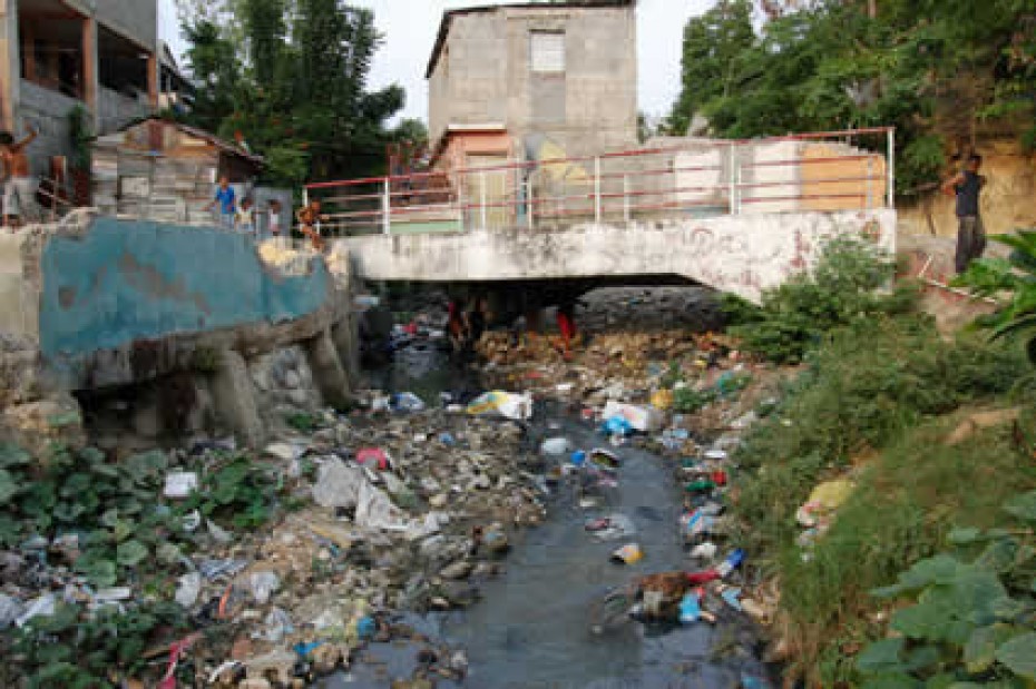 sewer and garbage near homes