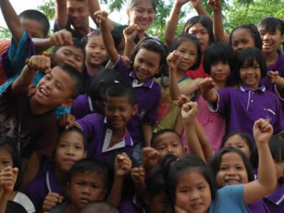large group of smiling children