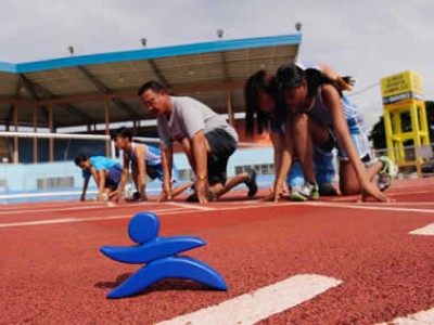 Skippy logo figurine on running track