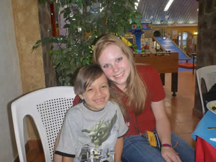 girl sitting with young boy