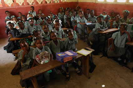 classroom filled with children at desks