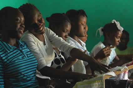 group of students learning to sew