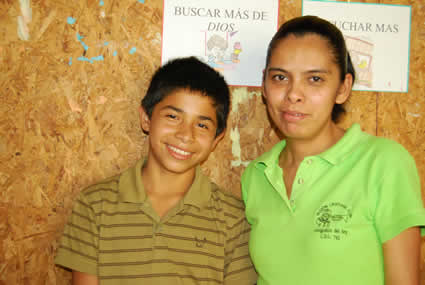 woman standing with boy