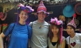group of people with party hats on