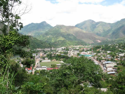 view of town with mountains in the background