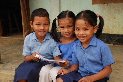 three young smiling girls