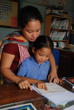 woman and child reading letter