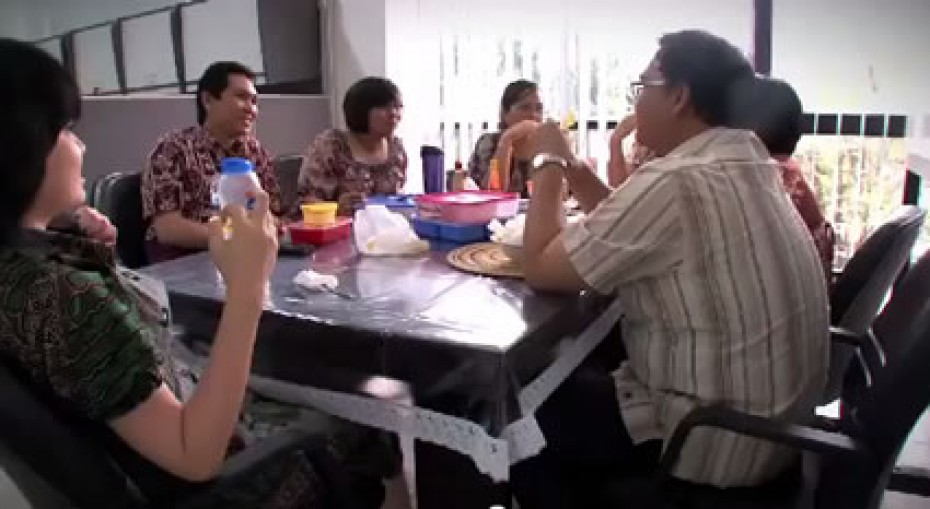 One-Step-Forward-IO people sitting around table