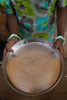 person holding empty dish