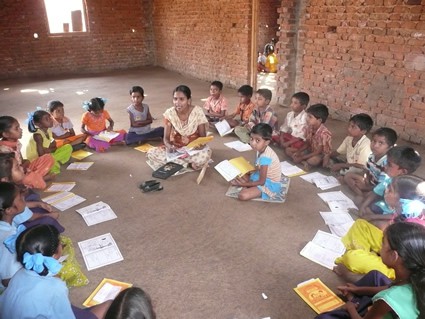 children receiving instructions on letter writing