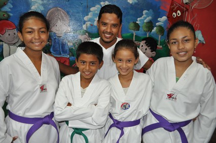 students and instructor smiling