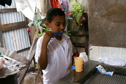 boy brushing his teeth