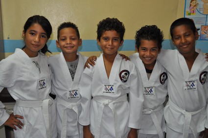 boys and girls in martial arts clothing