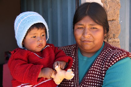 woman holding small child