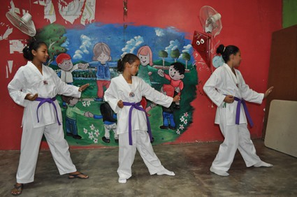 girls learning Taekwondo