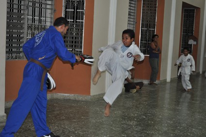 boy practicing Taekwondo