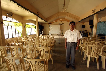 man standing inside a church