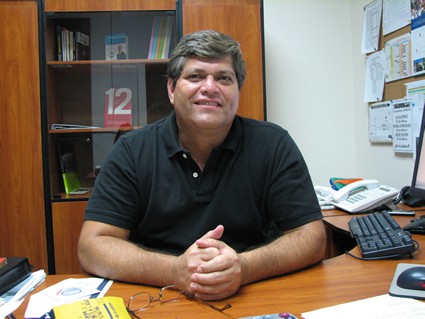 man sitting at a desk in an office