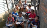 group of Nicaraguan children eating outside
