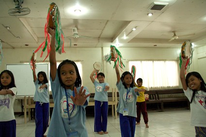 children with tambourines