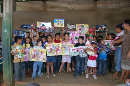 children showing their Christmas gifts