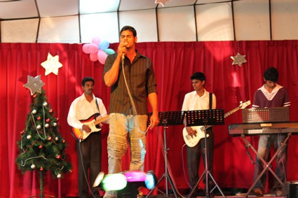 men performing a song on stage
