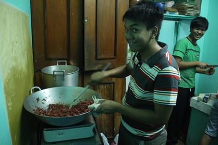 teen boys cooking