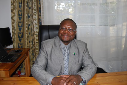 Tanzania country director at his desk
