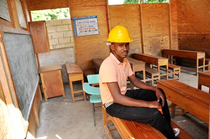 man wearing construction helmet