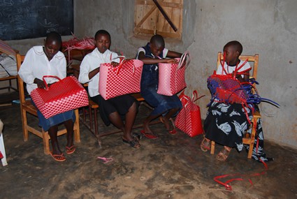 children looking through a bag of gifts